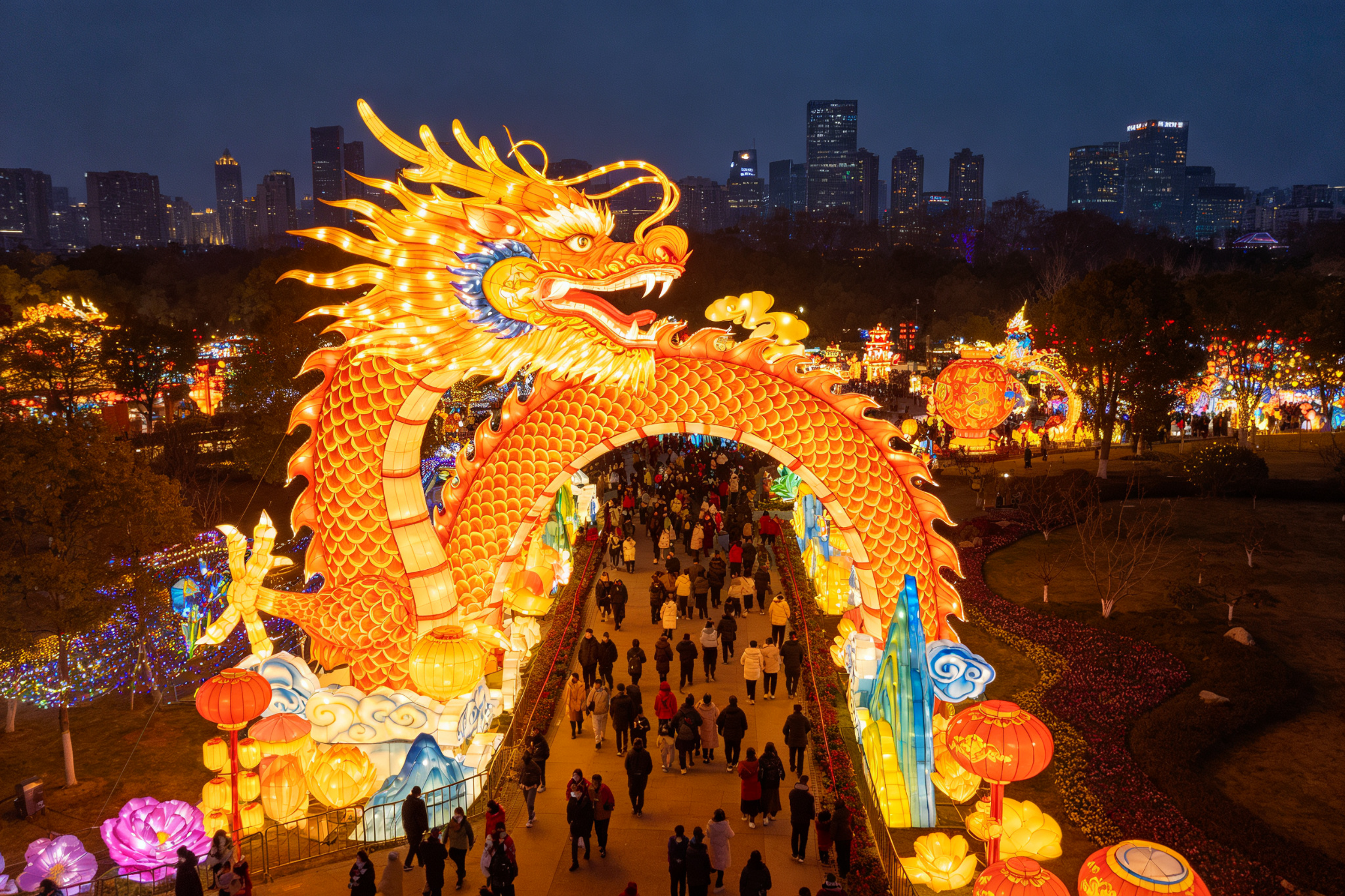 City park lantern festival with large-scale illuminated installations and crowds